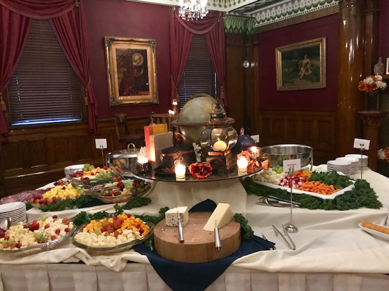 Cheese, fruit, and vegetable display in the Fireplace banquet room at The Corinthian Event Center.