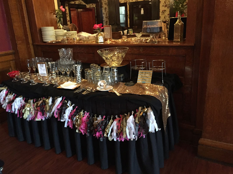 Punch and drinke by the fireplace in the Fireplace banquet room at The Corinthian Event Center.