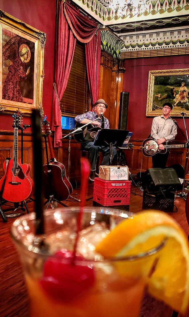 View from the bar of Band playing The Corinthian in the Fireplace banquet room at The Corinthian Event Center.