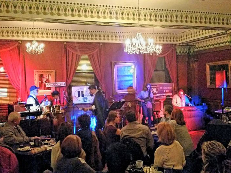 Band plays The Corinthian in the Fireplace banquet room at The Corinthian Event Center.