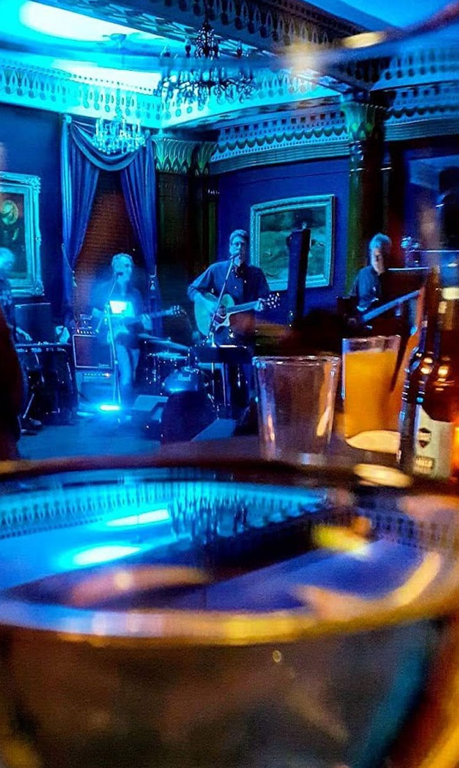 View from the bar of Terry Dach playing The Corinthian in the Fireplace banquet room at The Corinthian Event Center.