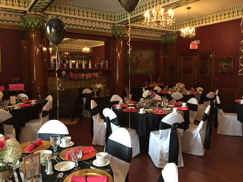 Fireplace banquet room at The Corinthian Event Center setup for a wedding venue.