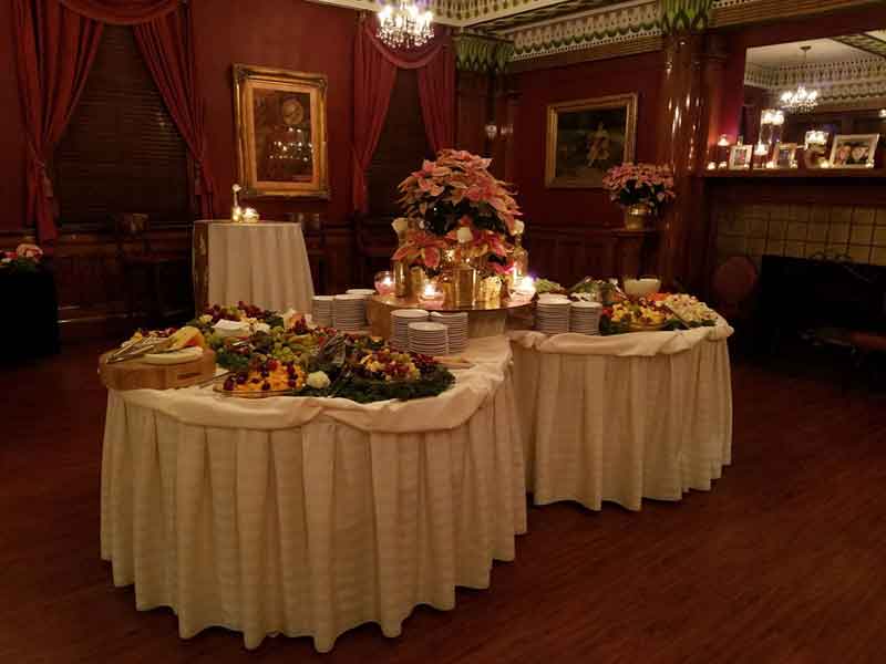 Bride and Groom cut cake at The Corinthian Event Center.