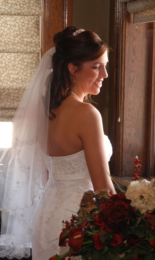 Bride in private bridal room at The Corinthian Event Center.