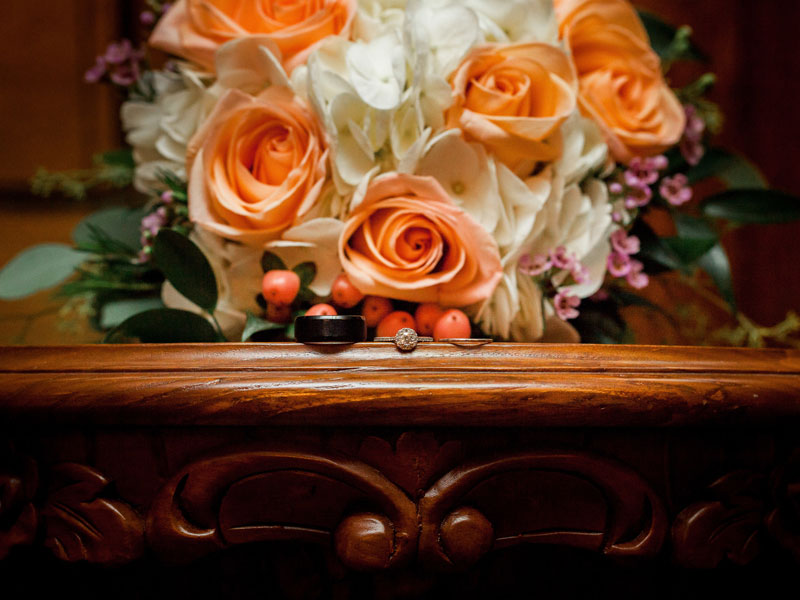 Bride and Groom wedding rings at The Corinthian Event Center.