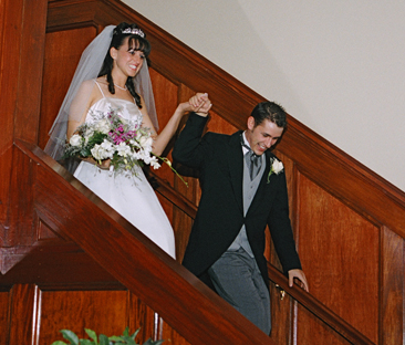 The Corinthinan Events Center wedding couple grand enterance.